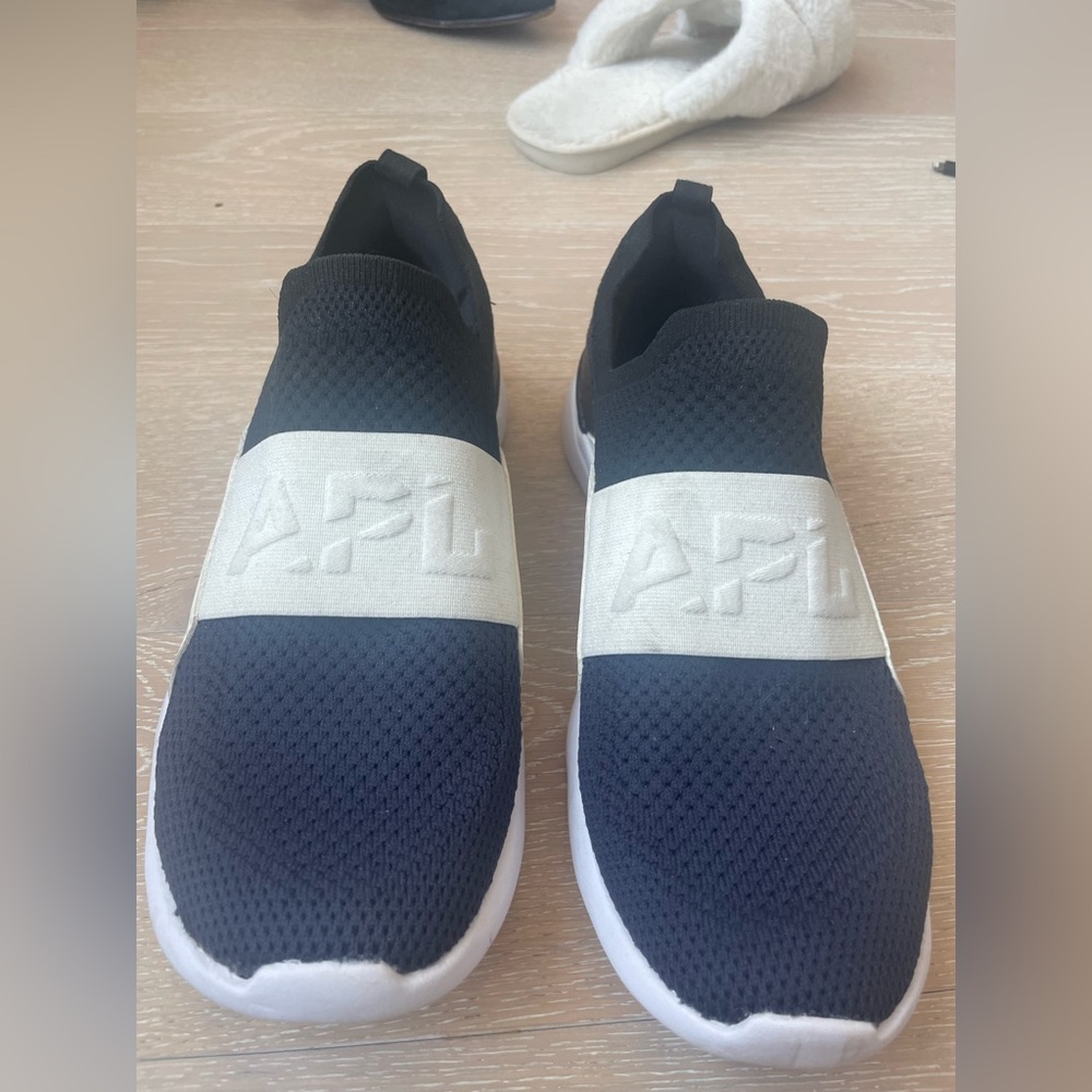 APL NAVY AND BLACK SLIDE ON SNEAKERS